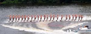 Ballet Girls dance on the water while holding the rope with their heel.