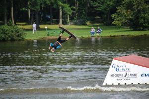 Christian goes head over heels on his Wakeboard, off of the jump ramp.